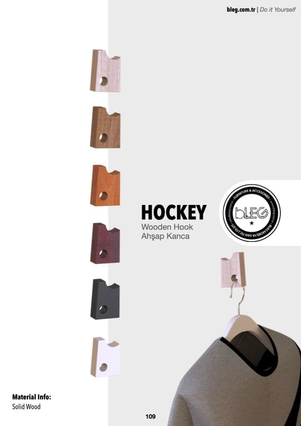 Minimalist wooden wall hook by BLEG with a distinctive cutout design, perfect for coats, hats, and accessories.